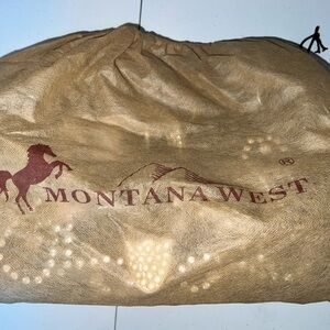 Montana West Conceal Carry Brown Bag
Never used - has original bag & stuffing